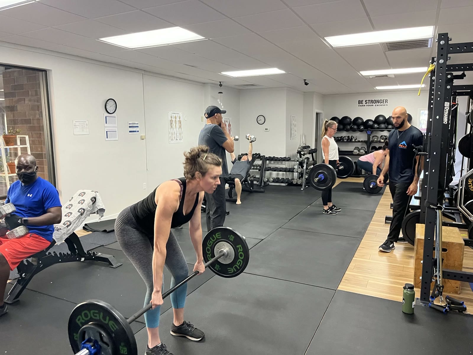 Members lifting together in a group class at Peak Strength and Fitness